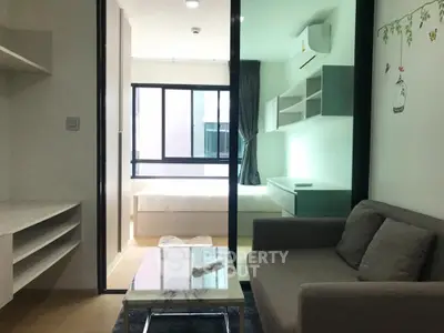 Modern apartment interior with cozy living room and bright bedroom