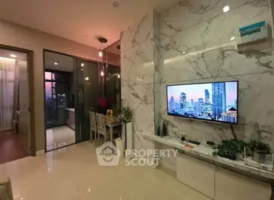 Modern living room with marble accent wall and cityscape view, featuring sleek TV setup and elegant dining area.