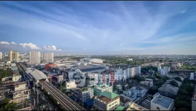 Stunning aerial view of urban landscape with modern buildings and expansive skyline.