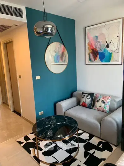 Stylish modern living room with abstract art and chic decor