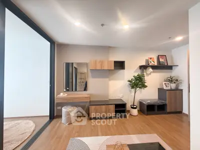 Modern living room with stylish furniture and wooden flooring