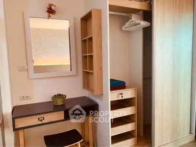 Chic modern bedroom with stylish wooden furniture and open closet space.