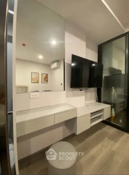 Modern living room with sleek TV setup and stylish decor