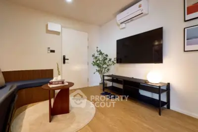 Modern living room with sleek TV setup and stylish decor