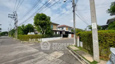 Charming suburban neighborhood with modern houses and lush greenery, perfect for family living.