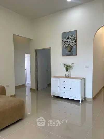 Spacious living room with elegant decor and modern furniture