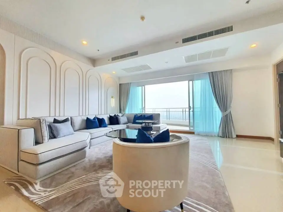 Luxurious living room with elegant decor and stunning balcony view