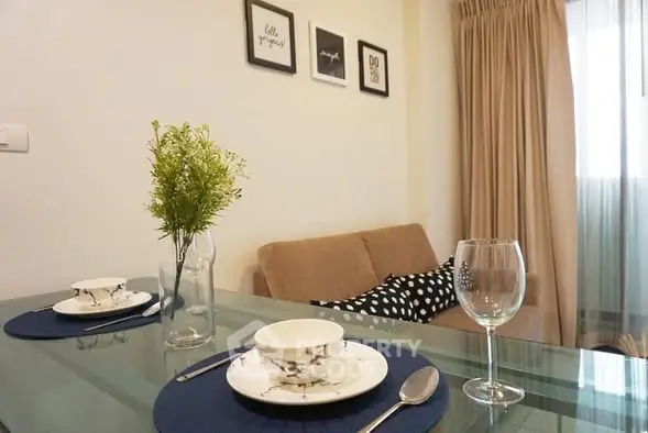 Cozy living room with elegant dining setup and stylish decor