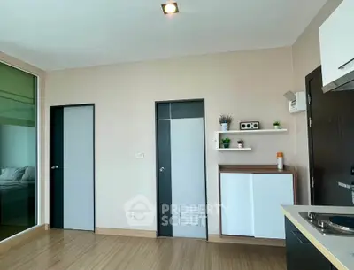 Modern minimalist living space with sleek design and wooden flooring
