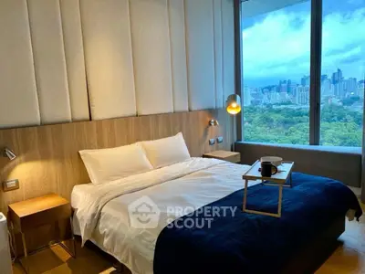 Luxurious bedroom with stunning city view and modern decor