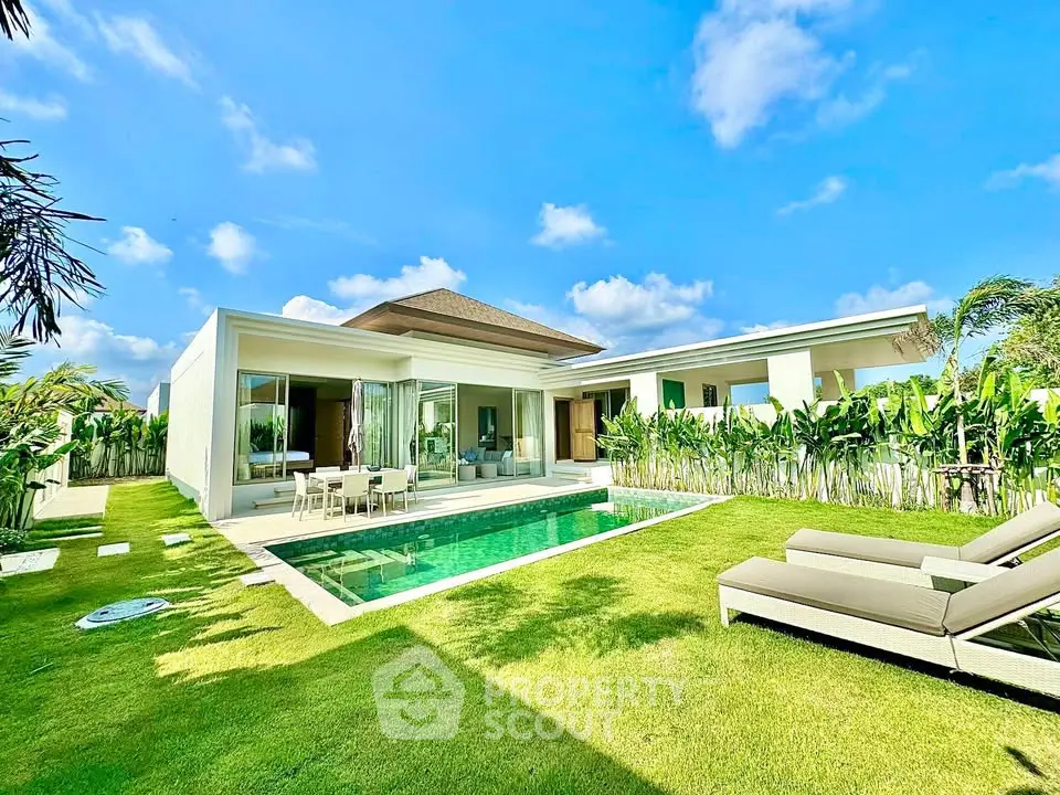 Luxurious modern villa with private pool and lush garden, perfect for serene living.