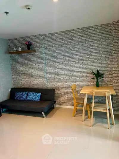 Modern living room with brick accent wall and cozy seating area