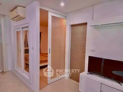 Modern apartment interior with sliding doors and air conditioning