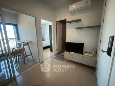 Modern apartment interior with open layout and balcony view