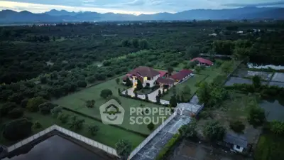 Luxurious countryside estate with expansive gardens and panoramic mountain views