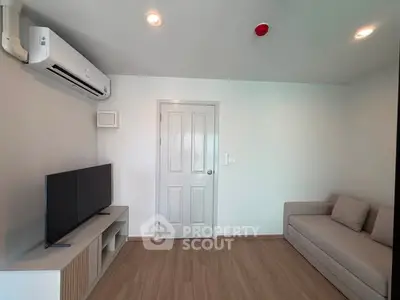 Modern living room with sleek air conditioning and minimalist decor