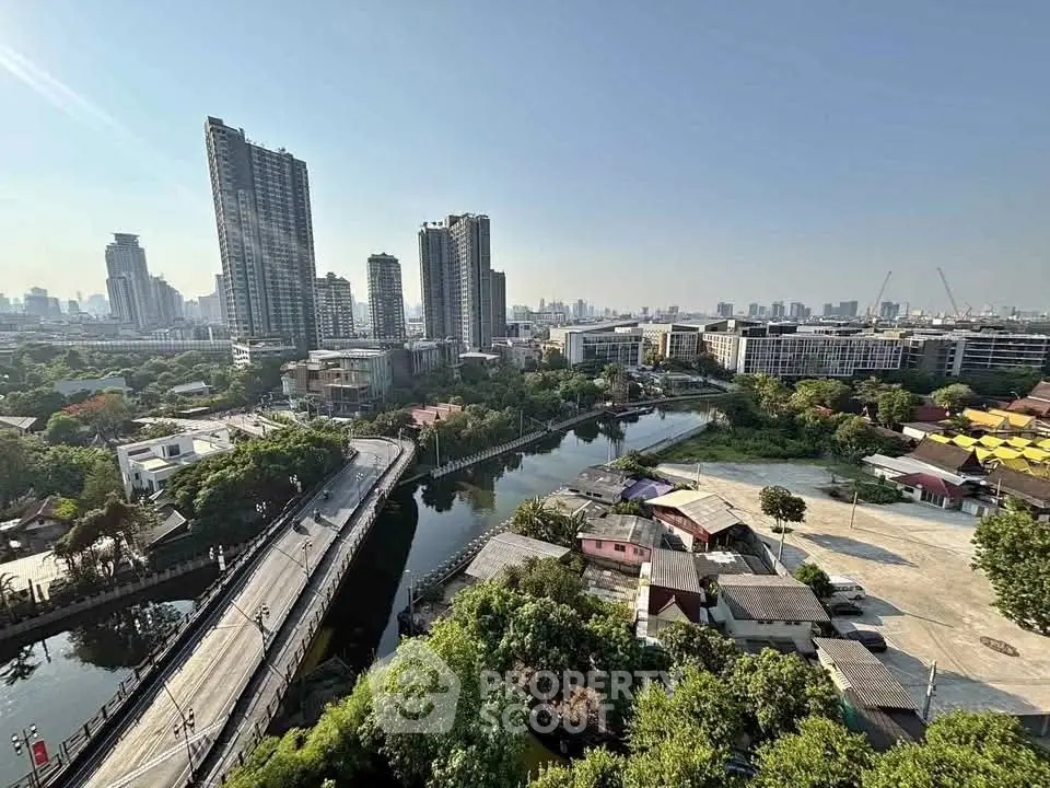 Stunning cityscape view with river and high-rise buildings, perfect for urban living enthusiasts.