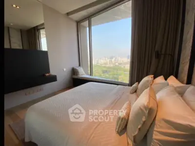 Luxurious bedroom with stunning city view and elegant decor