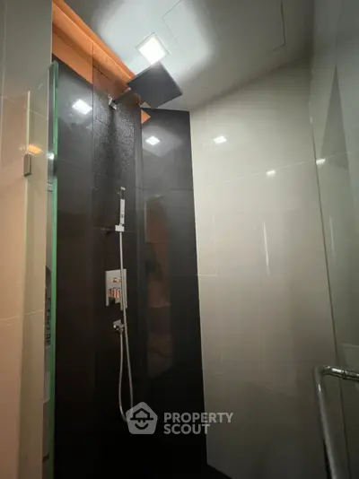 Modern bathroom with sleek shower design and contemporary fixtures