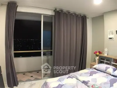 Cozy bedroom with city view and modern decor