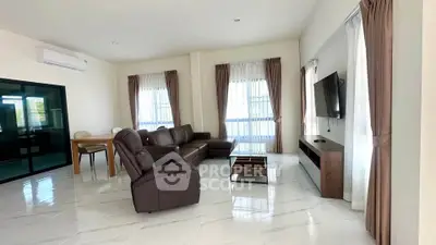 Spacious modern living room with sleek furniture and natural light