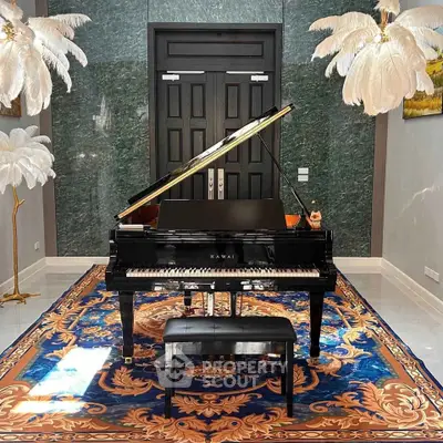 Luxurious music room with grand piano and elegant decor