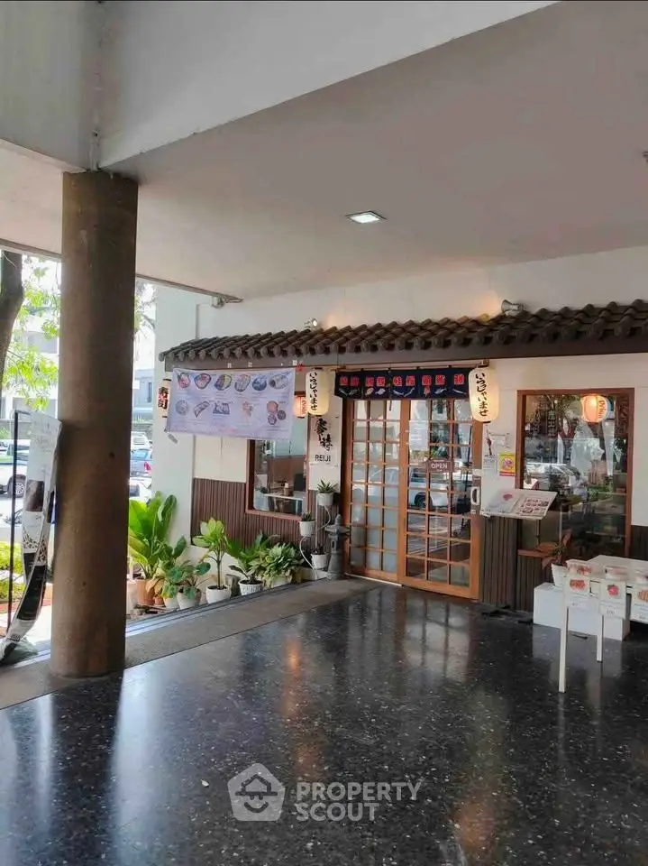Charming exterior of a Japanese restaurant with traditional decor and inviting entrance.