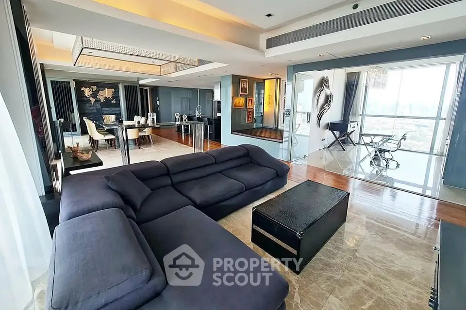 Luxurious modern living room with panoramic city views and elegant furnishings