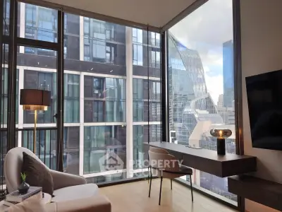 Modern living room with floor-to-ceiling windows offering stunning city views.