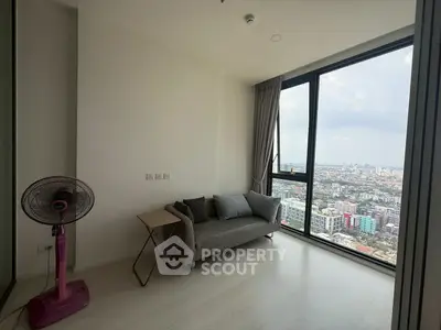 Modern living room with panoramic city view and minimalist decor