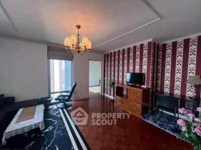 Elegant living room with stylish decor and parquet flooring