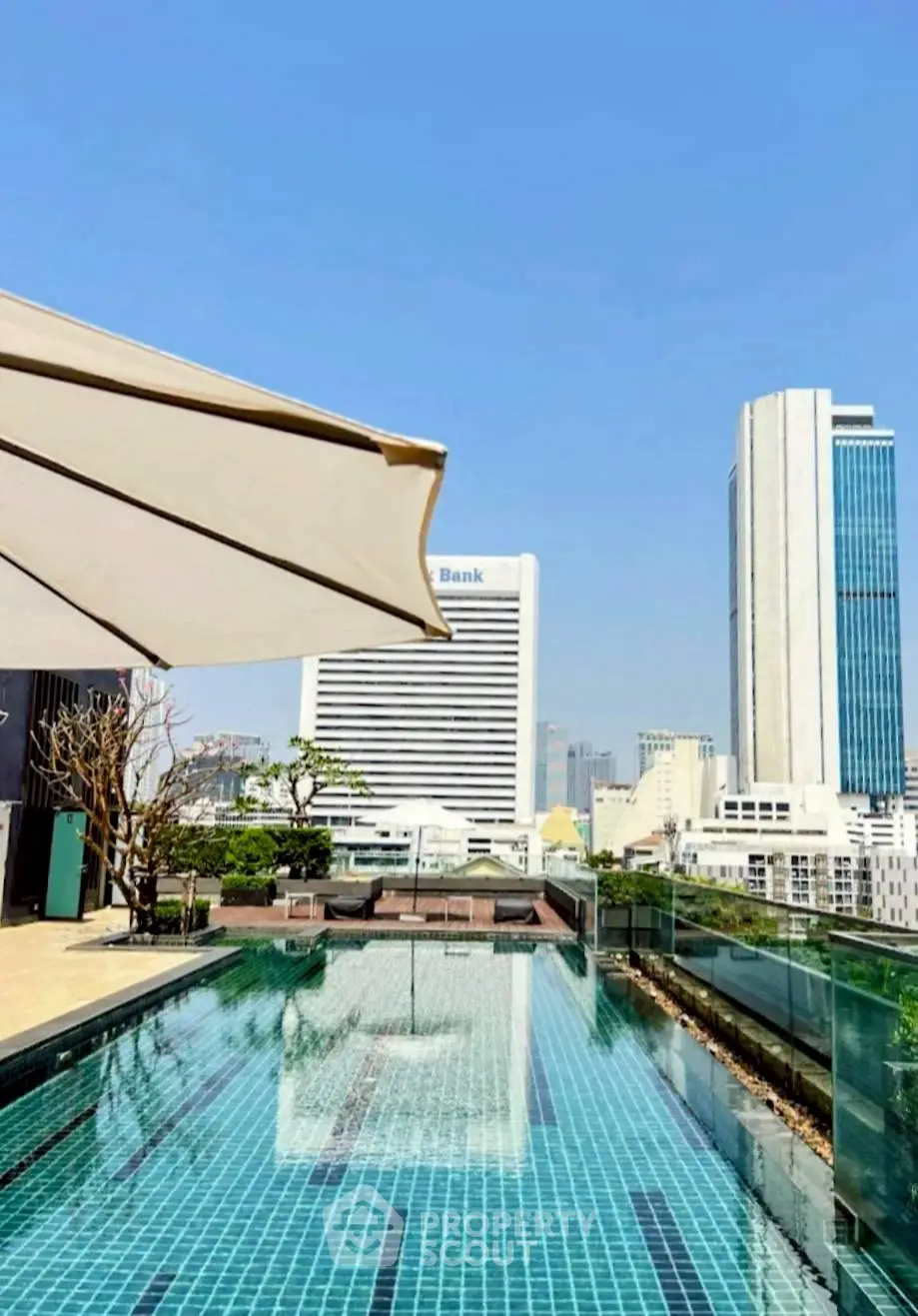 Stunning rooftop pool with city skyline views and modern design.