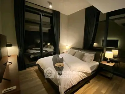 Luxurious modern bedroom with large windows and elegant decor