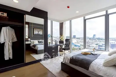 Luxurious bedroom with stunning city view and modern furnishings