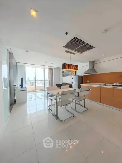 Spacious modern kitchen with open layout and city view