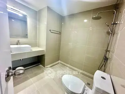 Modern bathroom with sleek fixtures and spacious layout