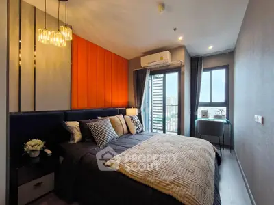 Modern bedroom with stylish decor and city view, featuring cozy bedding and elegant lighting.