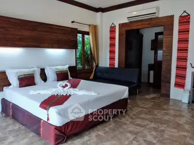 Luxurious bedroom with elegant decor and air conditioning in a modern home.