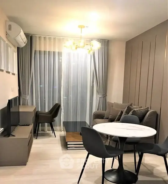 Modern living room with stylish furniture and elegant lighting