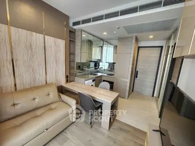 Modern living room with sleek design and open kitchen layout