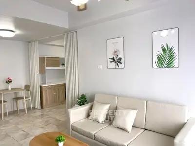 Modern living room with elegant decor and cozy seating area