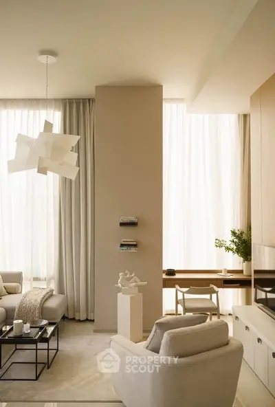 Elegant living room with modern decor, large windows, and cozy seating area.
