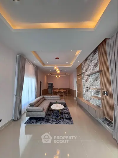 Luxurious modern living room with elegant lighting and stylish decor