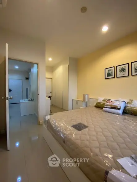 Cozy bedroom with modern decor and ample storage space