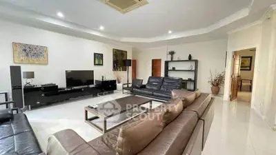 Spacious modern living room with sleek furniture and elegant decor