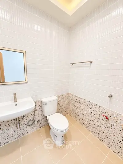 Modern bathroom with sleek fixtures and stylish tile design