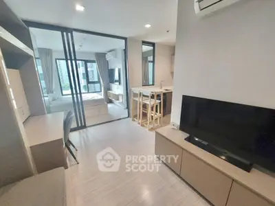 Modern open-plan apartment with sleek design and natural light