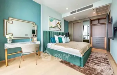 Luxurious bedroom with elegant decor, featuring a plush bed, stylish vanity, and ample closet space.