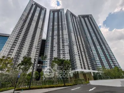 Stunning high-rise residential towers with modern architecture and lush landscaping.