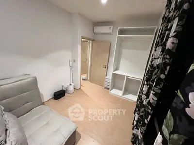 Cozy bedroom with open closet and modern air conditioning unit